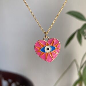 Evil eye heart shaped pendant necklace